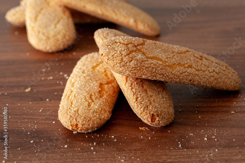 ladyfingers cookies on a wooden table photo