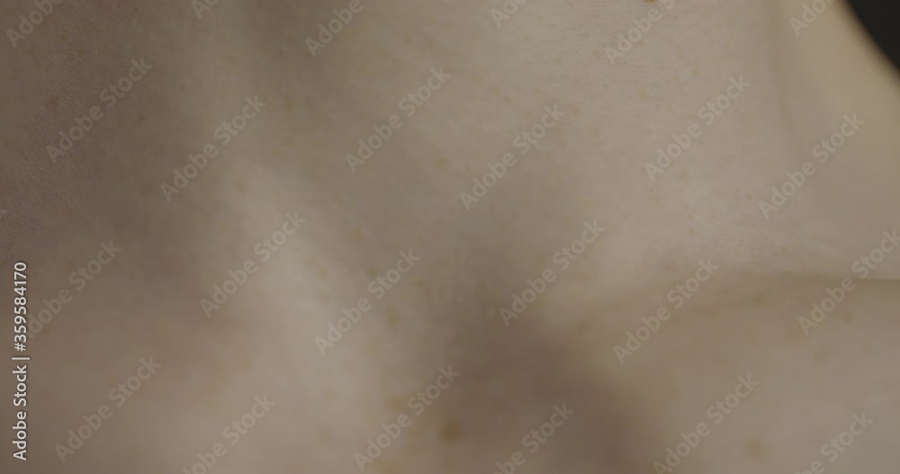 Male breathing close up of neck 4K Male breathing close up of neck 4K