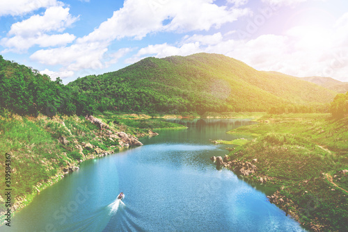 Background of embankment with mountain and river view.