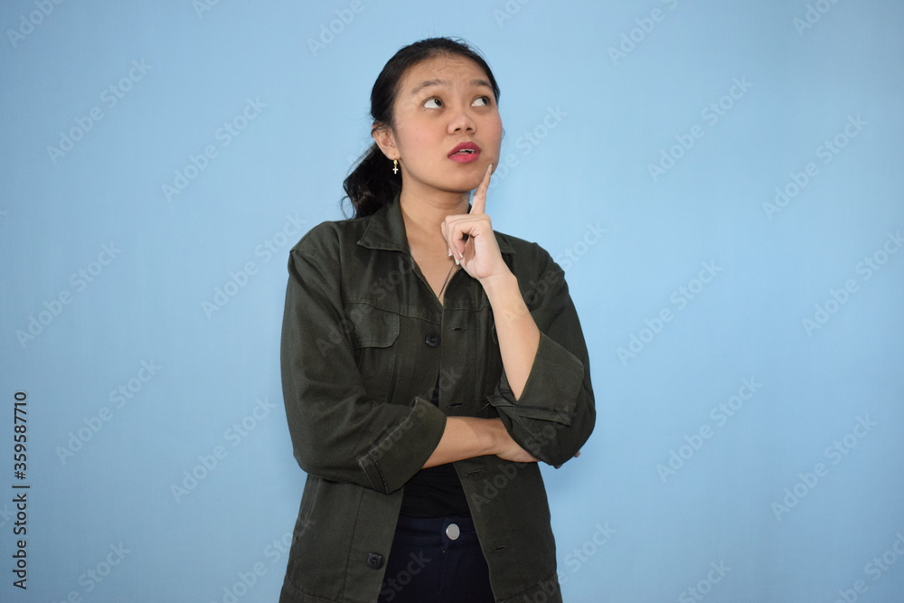 Portrait of Indonesian Woman Using Black shirt and jacket with isolated background Portrait of Indonesian Woman Using Black shirt and jacket with isolated background