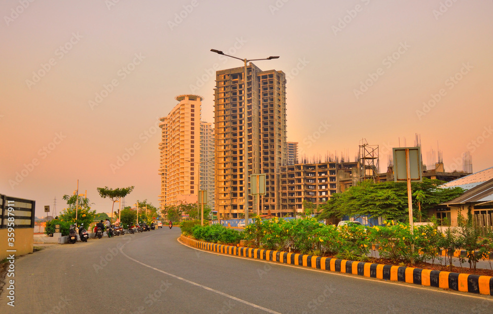 Sunset over high rise buildings in Kochi 