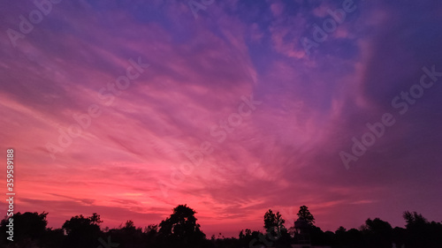 beautiful pink clouds with blue sky on evening at country side area