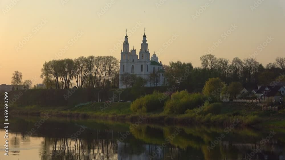 St. Sophia Cathedral on the banks of the Western Dvina river on an April evening. Polotsk, Belarus St. Sophia Cathedral on the banks of the Western Dvina river on an April evening. Polotsk, Belarus