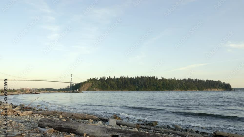 Beautiful Sea Waves At The Beach In Ambleside Park, West Vancouver, Canada With Island View - Wide Shott Beautiful Sea Waves At The Beach In Ambleside Park, West Vancouver, Canada With Island View - Wide Shott
