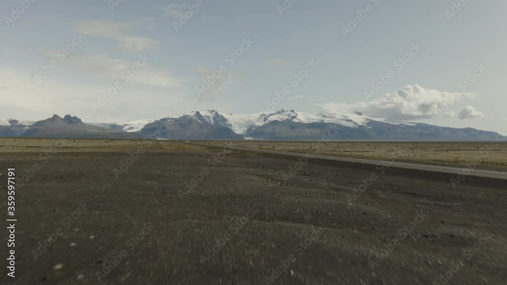 Aerial View, Vatnajökull Glacier, Ring Road, Car, Lava Fields, Iceland, Flying Low And Forwards Then Upwards (Camera Movement) Aerial View, Vatnajökull Glacier, Ring Road, Car, Lava Fields, Iceland, Flying Low And Forwards Then Upwards (Camera Movement)