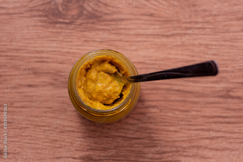 Mustard in jar shot from directly above