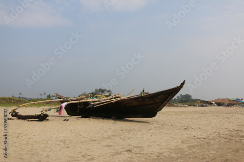 wooden boat on the beach of Goa