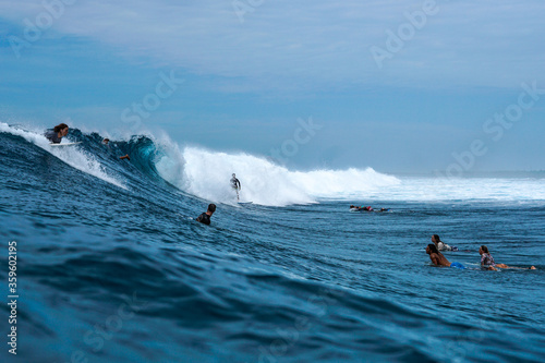 Sudenly came big wave and all surfers going to be under this wave, clean up set wave