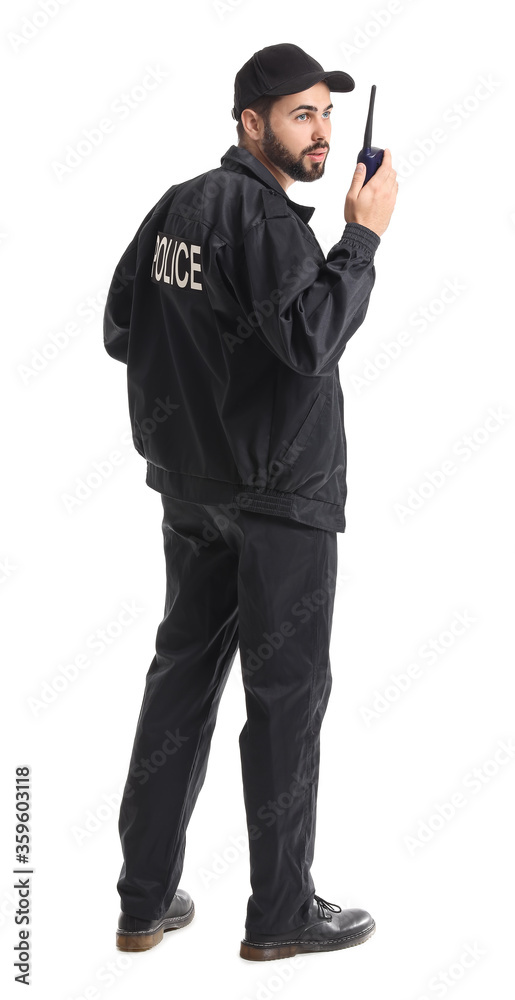 Handsome policeman with two-way radio on white background Handsome policeman with two-way radio on white background