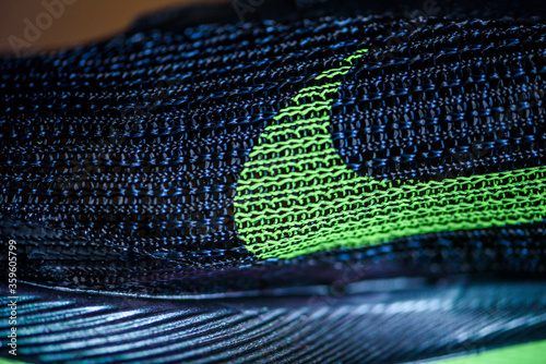ROME, ITALY, JUNE 23. 2020: Nike running shoes ALPHAFLY NEXT%.  Controversial green, black athletics marathon shoe. Detail on Air Zoomx  foam, Air zoom puck, Nike Atomknit upper. For Tokyo Olympics 2020 Stock