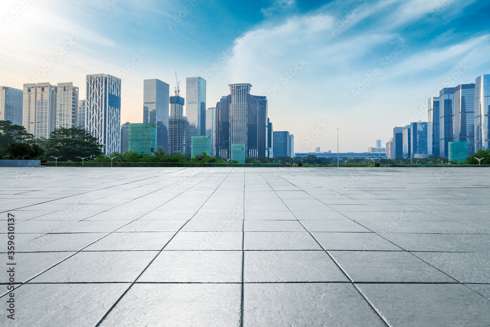 Empty square floor and modern city scenery in Shenzhen,China. Empty square floor and modern city scenery in Shenzhen,China.