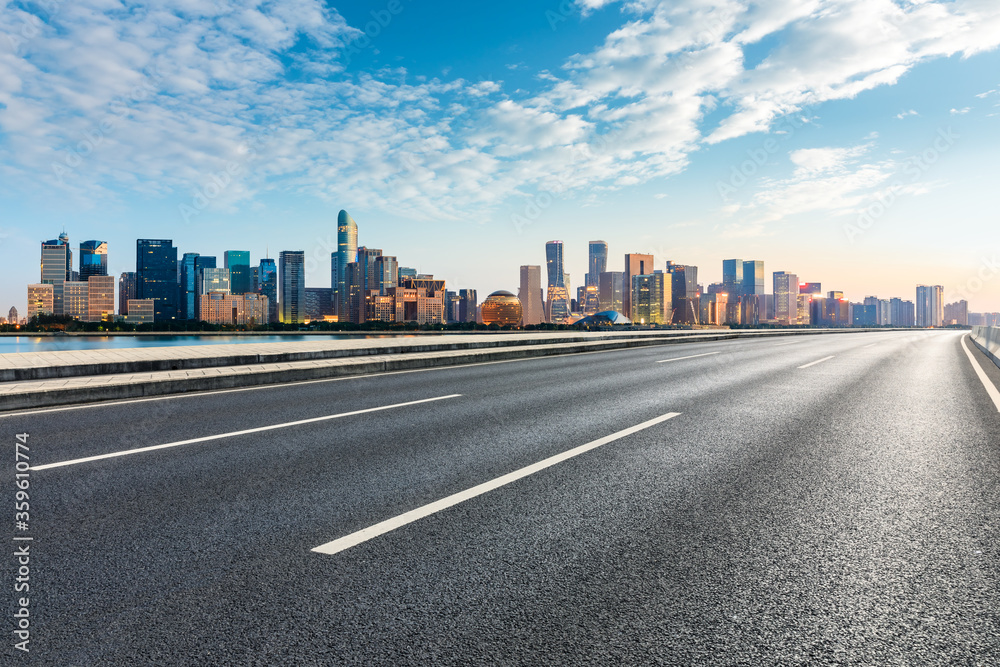 Hangzhou city skyline and buildings with asphalt road,China. Hangzhou city skyline and buildings with asphalt road,China.