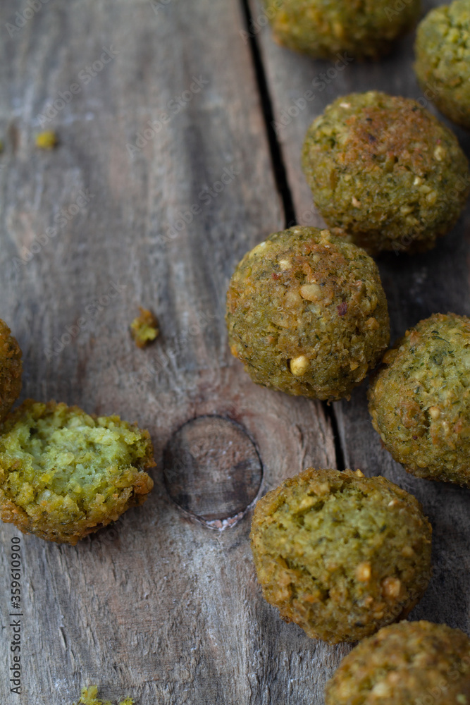 Falafel balls on a wooden background Falafel balls on a wooden background