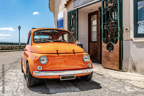 Amalfi, Coast, Italy. May 27th, 2020. An old style retro Fiat 500, parked along the road to Positano. photo