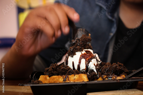 Icecream named as Chunkey Pandey.Sweet ,Cold with some hot choco lava .Tasty and yummy.