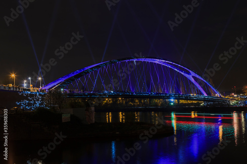Night picture of East harbor bridge in Frankfurt during lighting show Luminale 2014 in April