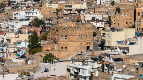 Town of Savur with old stone houses on a hill, Mardin, Turkey. © CanYalicn