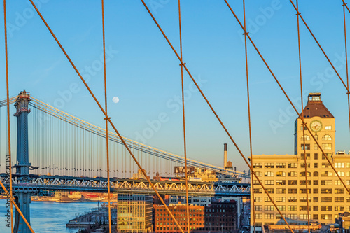 View of Manhattan bridge from Brooklyn bridge in afternoon light