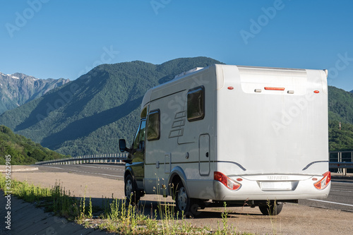 A house on wheels. A motorhome. Camper. Rv. Camping in the mountains. Freedom. Journey out of town. motor home.
