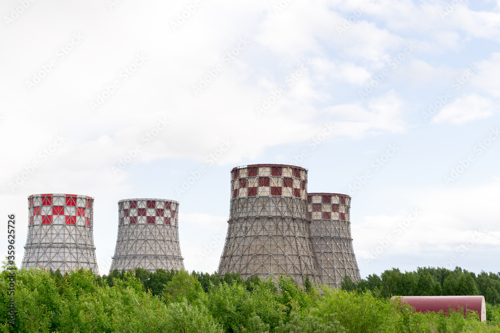 power plant with pipes, bright Sunny day blue sky, place for text