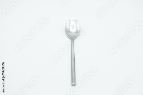 isolated stainless spoon in a white background