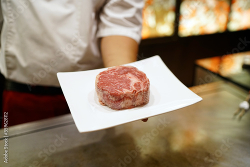 Dry Aging steak with Koji Rice - Grilled beef on teppanyaki grill plate, Prepared for Teppanyaki style, Enjoy the spectacle of cooked to perfection by chef, Traditional Japenese steakhouse.