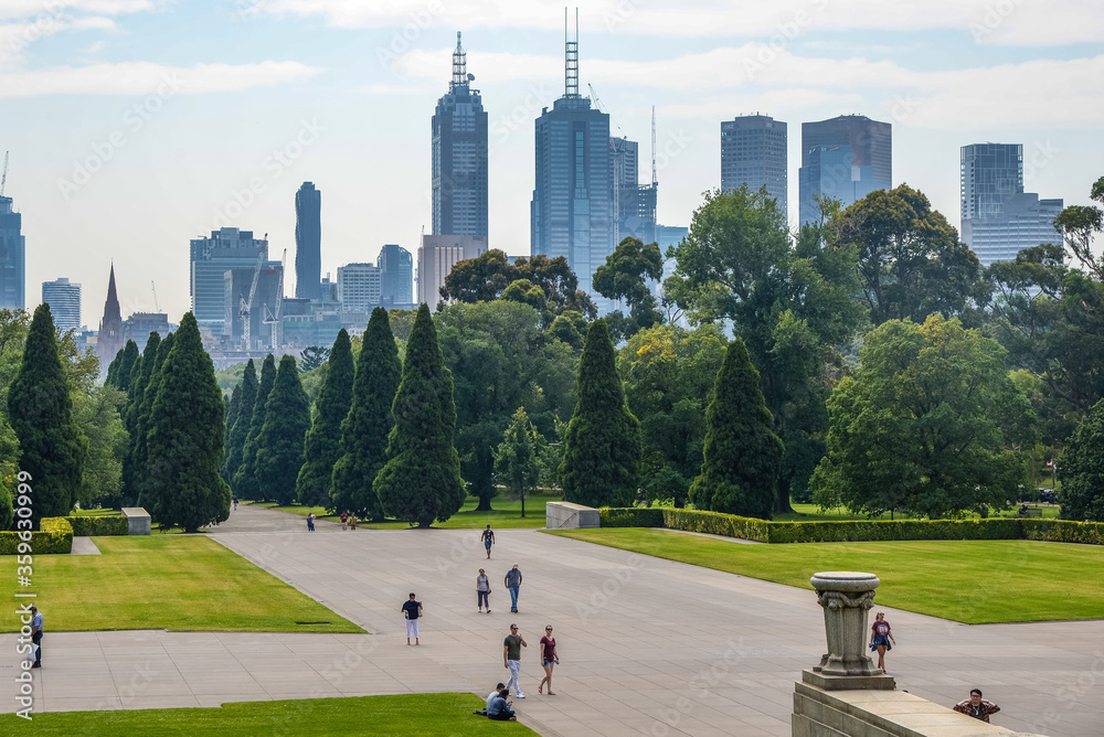Naklejka premium View of the Shrine of Remembrance with people and tourists in Melbourne Victoria Australia. It was built to honour the men and women of Victoria who served in World War I