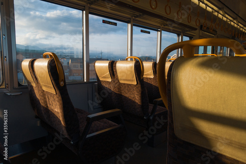 乗客のいない朝の電車内の風景 photo