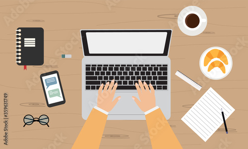 Man using laptop. Top view of workplace with businessman.