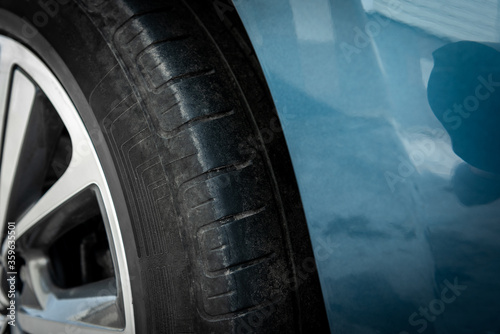 Close up of rubber car on wheel. © Natallia