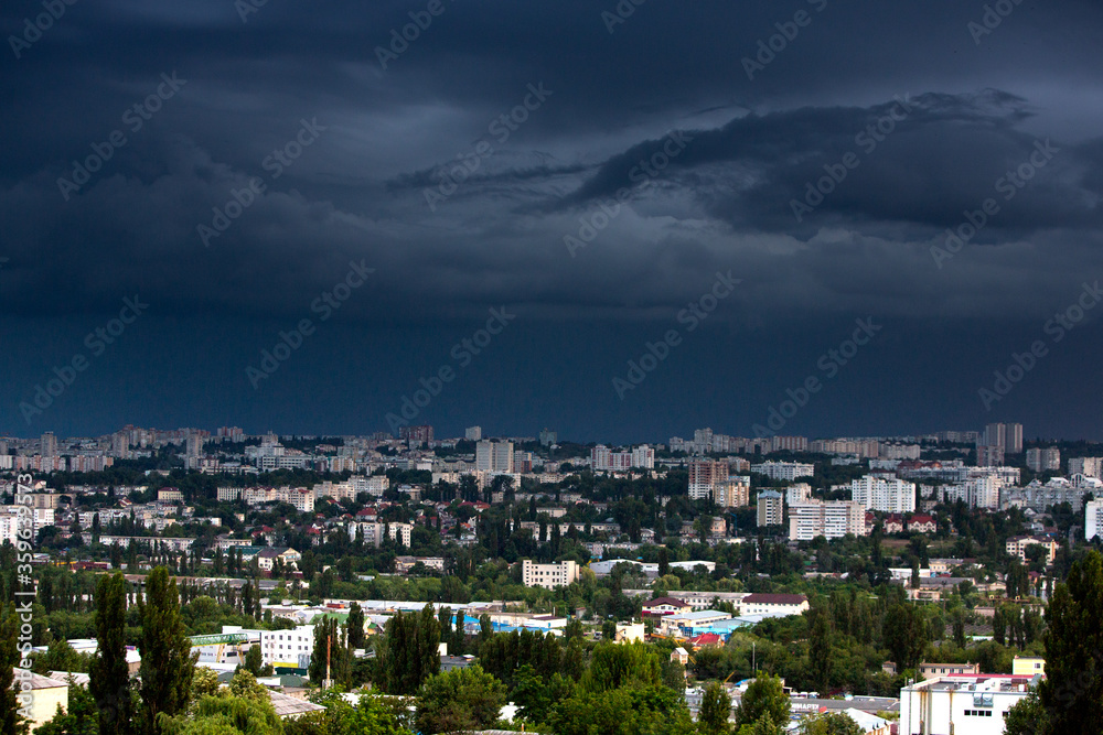 Chisinau, the capital city of the Republic of Moldova. Storm clouds over city. Cloud over the city at the sunset. Chisinau, the capital city of the Republic of Moldova. Storm clouds over city. Cloud over the city at the sunset.