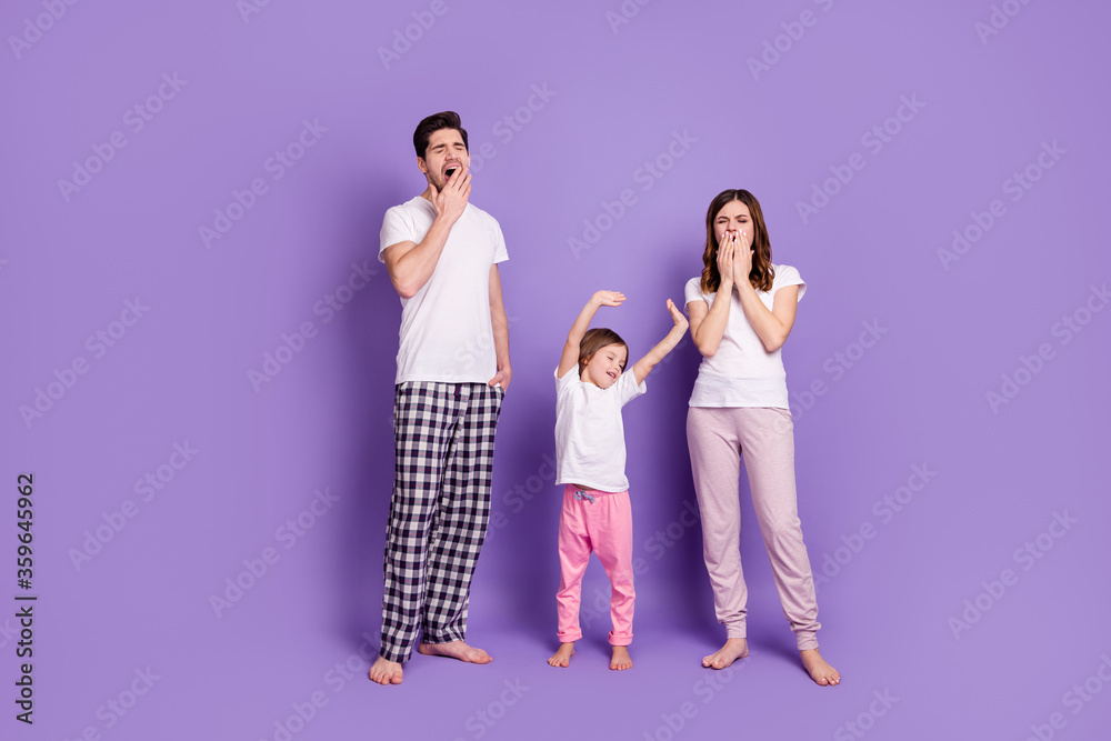 Full length body size view of nice sleepy family dad mom offspring daughter wearing pajama waking up stretching yawning day-off dreaming isolated bright vivid shine vibrant violet color background