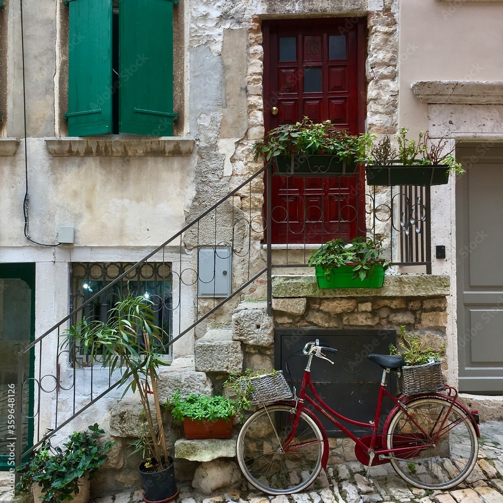 bicycle in front of a house in rovinj croatia bicycle in front of a house in rovinj croatia