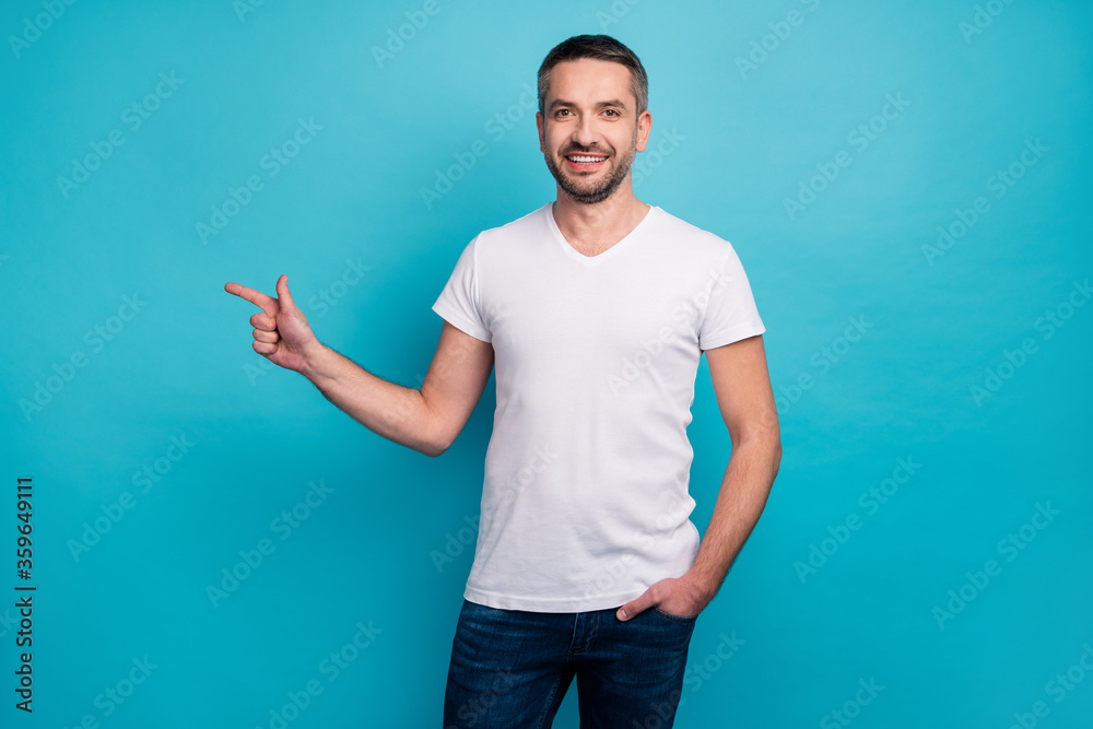 Fototapeta premium Portrait of his he nice attractive content cheerful cheery bearded guy showing copy empty blank space isolated over bright vivid shine vibrant blue color background
