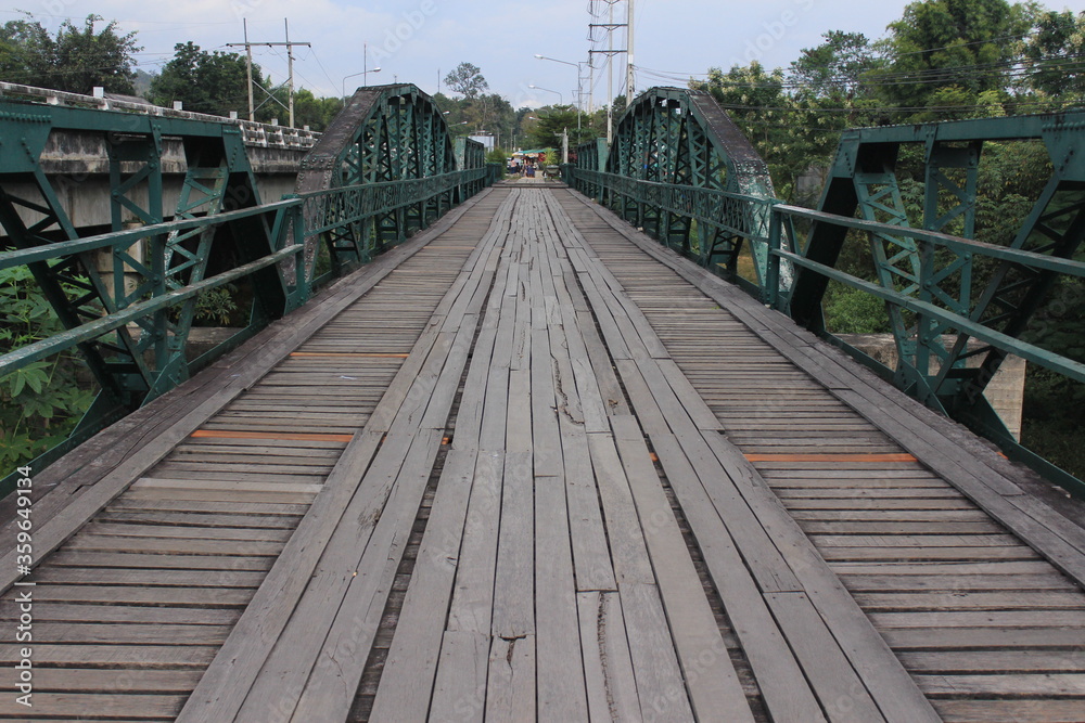 Fototapeta premium wooden bridge over the river