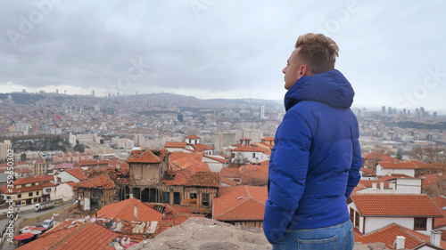 A tourist looks at the panorama of Ankara  the capital of Turkey.