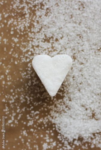 A heart shape sugar candy, close up