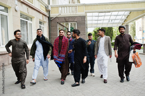 Group of pakistani man wearing traditional clothes salwar kameez or kurta.