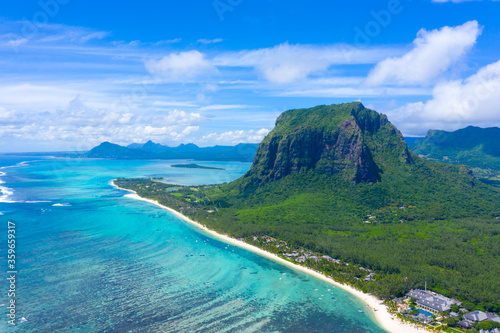 Aerial view of Le Morne Brabant, a UNESCO world heritage site.Coral reef of the island of Mauritius. panorama underwater waterfall photo