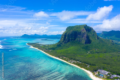 Aerial view of Le Morne Brabant, a UNESCO world heritage site.Coral reef of the island of Mauritius. panorama underwater waterfall © netsay