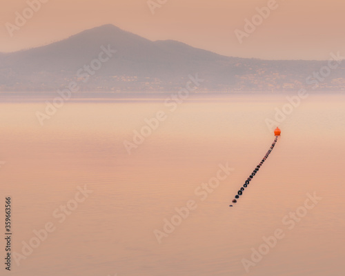 lake buoy at sunset view