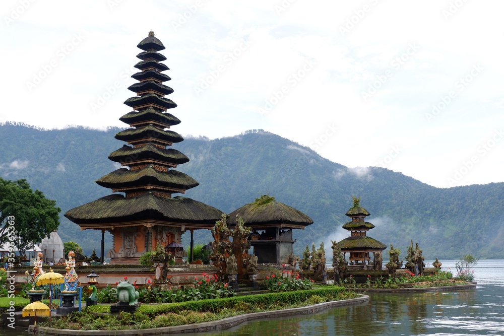 A beautiful temple surrounded by sea and mountains in Bali A beautiful temple surrounded by sea and mountains in Bali