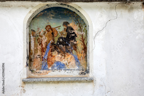 Canza (VCO), Italy - June 21, 2020: A religius paint at Canza village, Formazza Valley, Ossola Valley, VCO, Piedmont, Italy photo