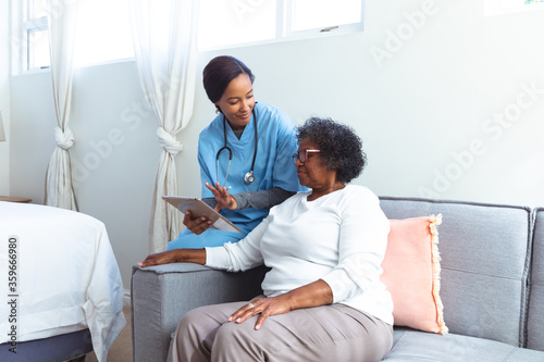 African American women at home during quarantine lock down for coronavirus covid19 photo