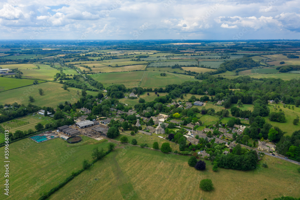 Cotswold village and landscape from drone