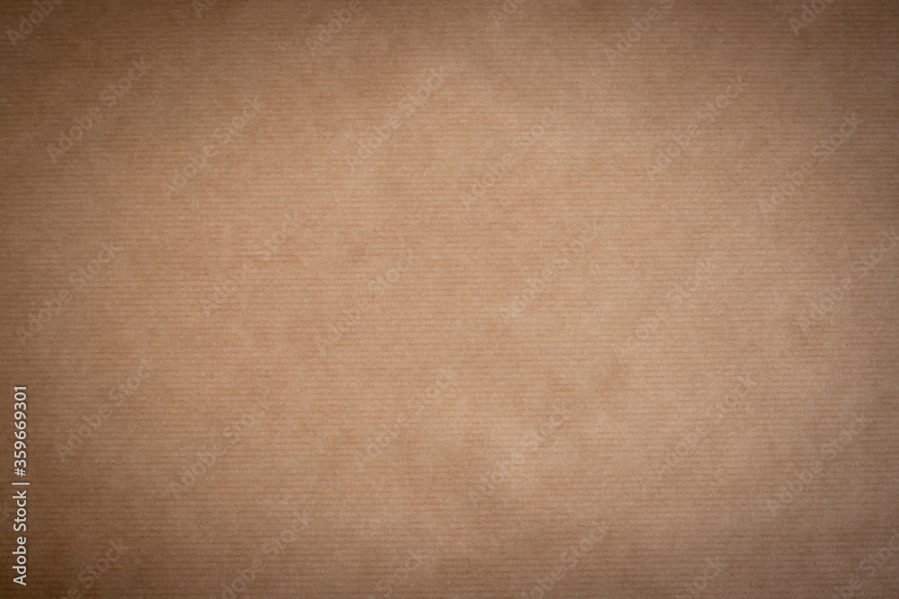 kraft paper texture or background with stripes and dark vignette borders