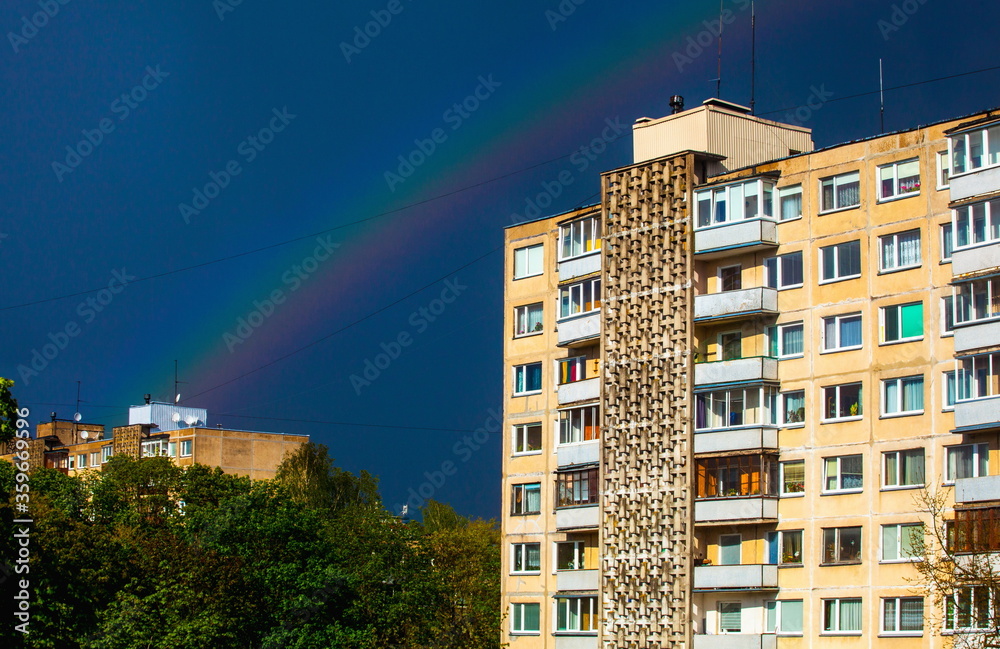 Fototapeta premium Rainbow over residential houses
