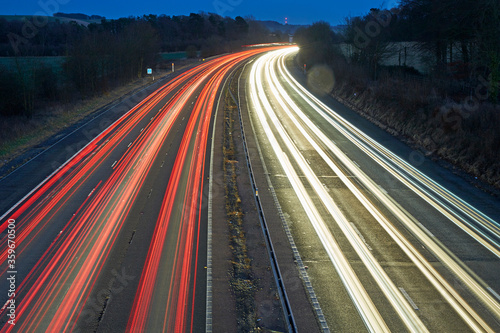 Elevated view of car light trails in the M4 in Swindon, Wiltshire, UK