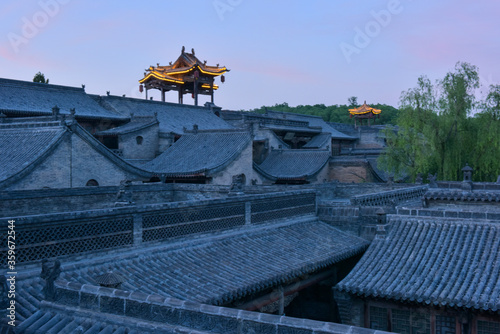 Chinese ancient buildings in the setting sun