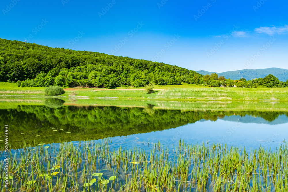 Beautiful green landscape in Lika region on Svica lake, Croatia
